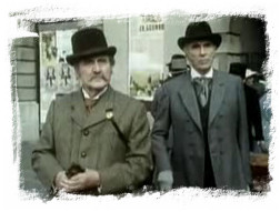 Patrick Macnee as Dr Watson and Christopher Lee as Sherlock Holmes in 'Sherlock Holmes and the Leading Lady'